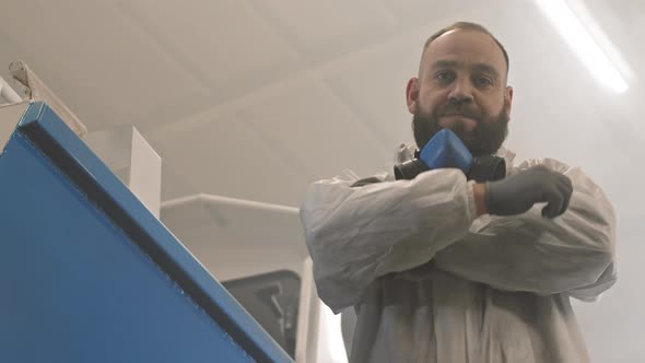 Man in Protective Suit Posing