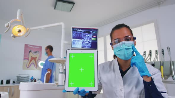 Pov Patient To Dentist Doctor Showing Tablet with Chroma Display