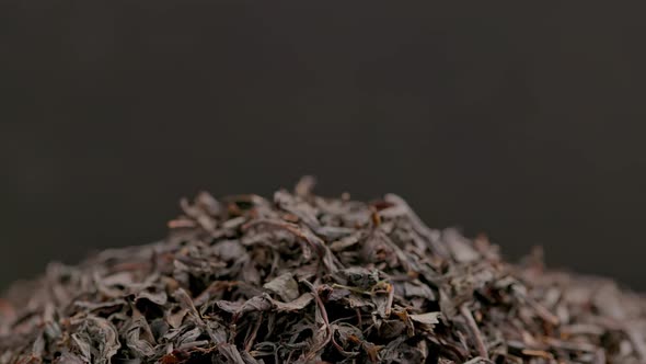 Looped Spinning Dry Black Tea Full Frame Closeup Background