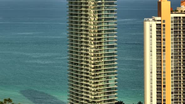 Aerial footage Armani Casa Sunny Isles Beach Miami FL parallax shot