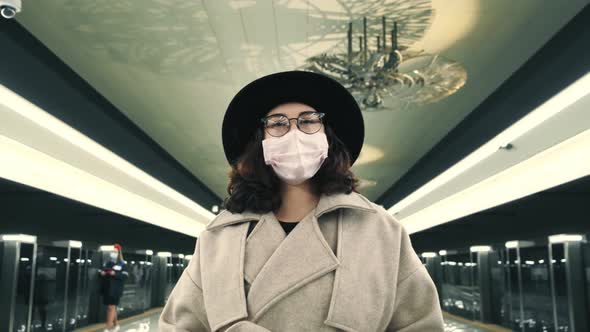 Closeup of a Girl in a Hat in the Subway During the Quarantine