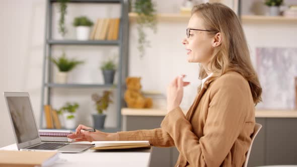 Woman Teaching Class Remotely during Pandemic