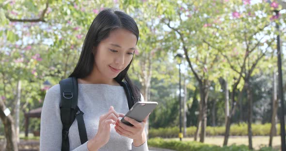 Woman use of smart phone at outdoor