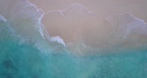 Beautiful drone abstract shot of a white sandy paradise beach and blue ocean background in best quality