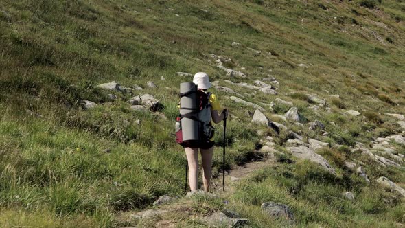 Woman Tourist walking on top of mountain. Hikers travel enjoy life scenic nature landscap