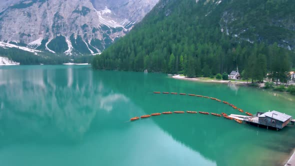 Beautiful Landscape of Braies Lake Lago Di Braies Romantic Place with Wooden Bridge and Boats on the