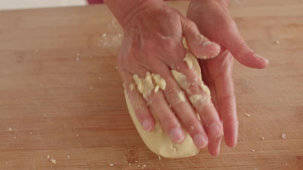 The Strength Chef Hands Hands of the Cook Knead the Dough Wooden Board