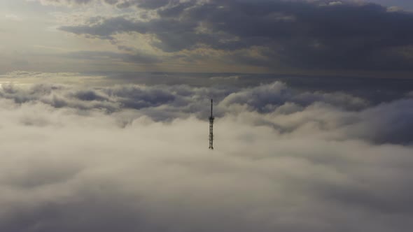 Aerial View of the Upper Part of the Broadcasting Tower in the Fog