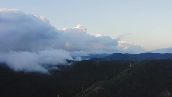 Impressive Video of a Cloudy Front Enveloping the Tops of High Forested Hills