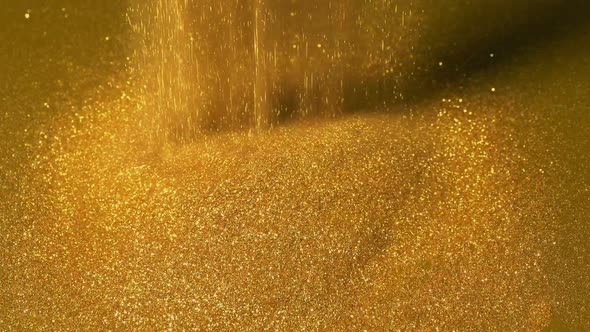 Gold Dust Is Poured Into Pile