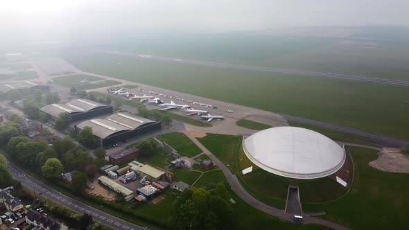 Drone aerial shot of grounded parked aeroplanes during Covid pandemic lockdown