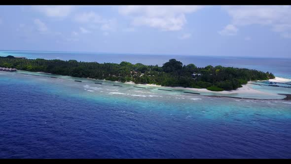 Aerial top view sky of tranquil coastline beach journey by blue sea with white sand background of a 