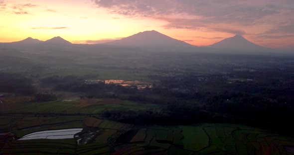 Drone view of four mountains (telomoyo, andong, merbabu and merapi). volcano in sunrise sky. Mountai