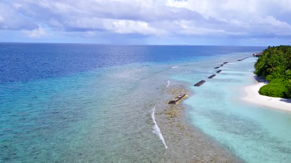 Drone scenery of coast beach by ocean and sand background