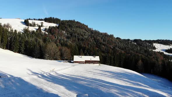 areal footage of an old farm house in Schwarzenberg, Bregenzerwald.