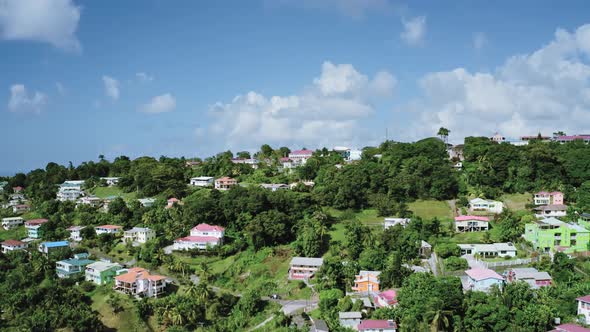 Aerial video shooting of houses with multi-colored roofs (Saint Lucia)
