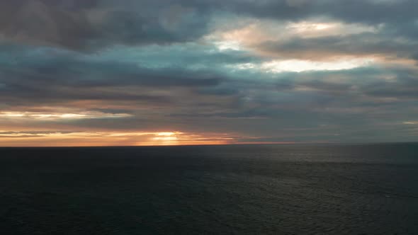 Cloudy Sky Over the Sea During Sunset