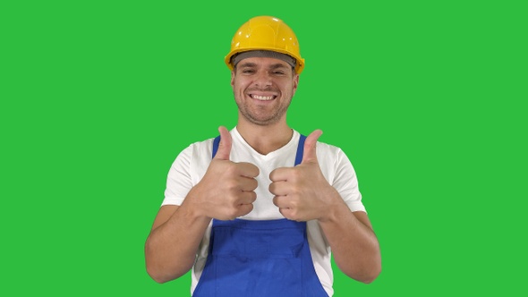 Amazed builder contractor is showing thumbs up Happy about