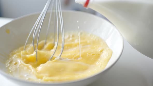 Woman Preparing Homemade Omelette