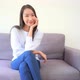 Asian woman sit on sofa and relax - VideoHive Item for Sale
