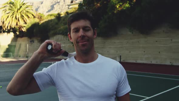 Man playing tennis on a sunny day