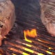 Steak on grill. Grilling on fire meat - VideoHive Item for Sale