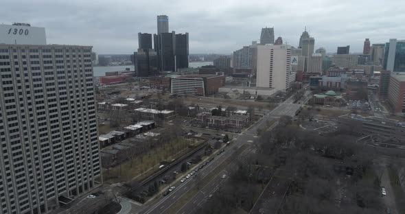 Aerial view of downtown Detroit and surrounding neighborhood on a cloudy and gloomy day. This video