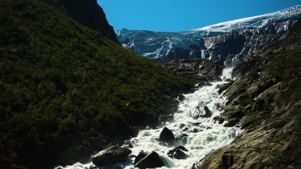 River from Buarbreen glacier in Folgefonna national park Norway.