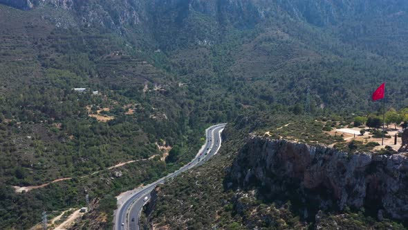 Flying high above the highway that cuts through the mountains near Nicosia