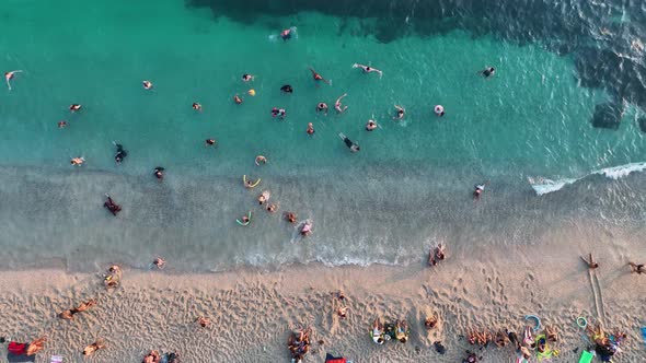 People swim in the azure sea aerial view 4 K Turkey Alanya