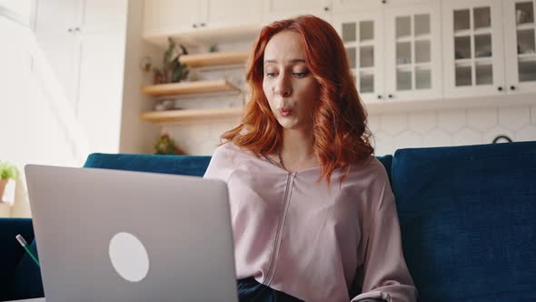 Modern Interior Designer a Girl with a Prosthetic Hand is Discussing a Working Project Via Video