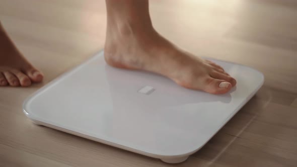 Step On Bathroom Scale.Diet Woman Standing Weighing Scales.Overweight Woman On Scales Measure Weight