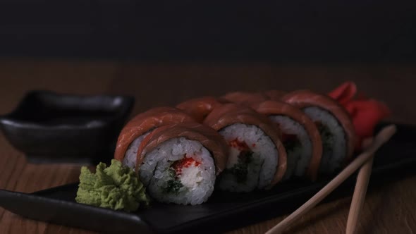 Sushi on a Wooden Table in Restaurant Delicious Japanese Food Sushi Rolls