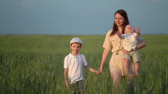 Active Family Holiday Mom with Two Sons