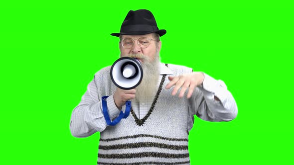 Expressive Angry Man Speaking in Megaphone