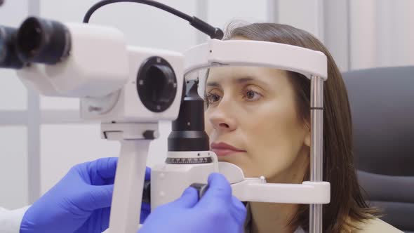 Woman Getting Slit Lamp Examination in Ophthalmology Clinic