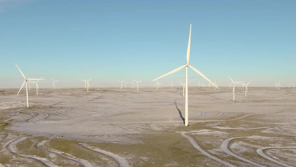 Aerial shots of wind turbines on a cold winter afternoon in Calhan, Colorado