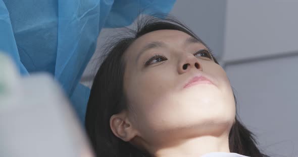 Woman having dental check up at dental clinic