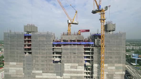 Aerial view of modern high rise building under construction in the busy city centre business distric