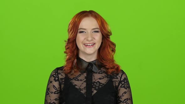 Girl Smiles, She Is Happy and Insanely Beautiful. Green Screen. Slow Motion