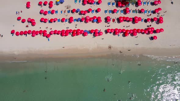 Nature video. Aerial view top view of tropical beach sea in summer travel. Nature and travel concept