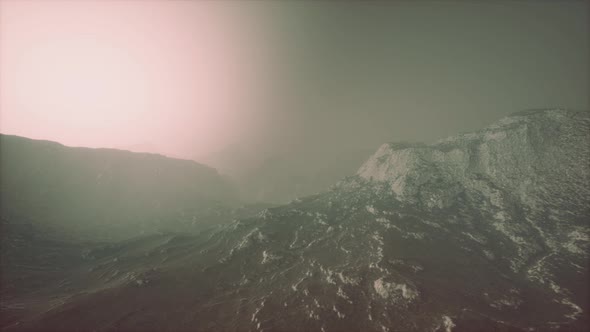 Landscape of the Dolomites Mountain Range Covered in the Fog