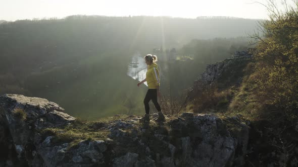 Aerial view of a woman on the rocks, Dinant, Namur, Belgium.