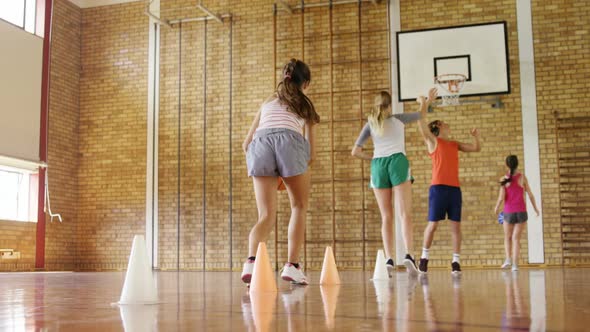 Group of high school kids playing basketball