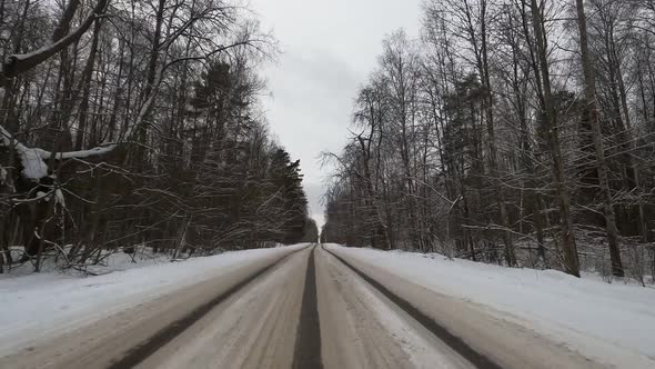 View of the movement car of snowy road.