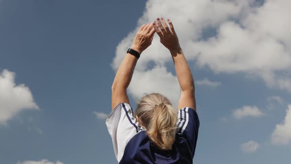 Active Mature Senior Woman Doing Sports Cool Down Take Deep Breath Hands Up