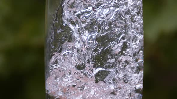 Water being poured into Glass, Slow Motion