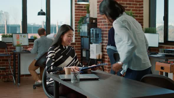 HR Employee Greeting Female Applicant at Job Interview