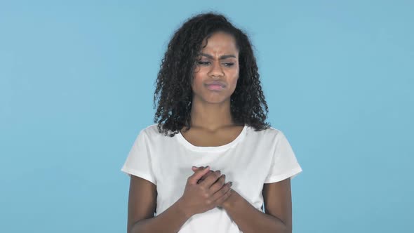 Sad Upset African Girl Isolated on Blue Background