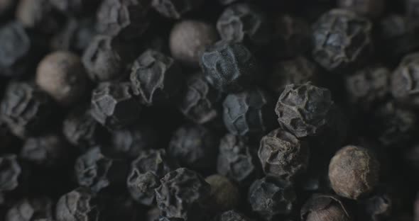 Macro of Peppercorns on a white plate